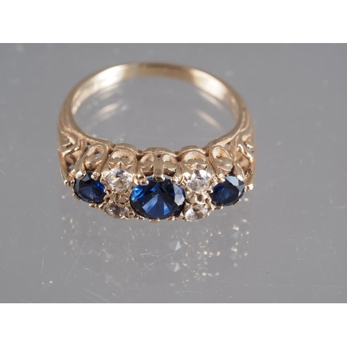 317 - A 9ct gold, diamond and sapphire seven-stone dress ring, size O, 3.4g