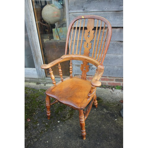 503 - A 19th Windsor spindle and fruitwood splat back elbow chair, on turned and stretchered supports