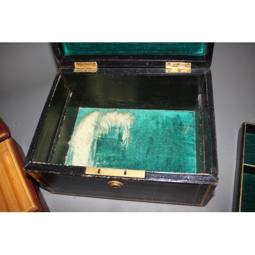 304 - A Morocco tooled and gilt leather jewellery box, and a leather clad cigar box