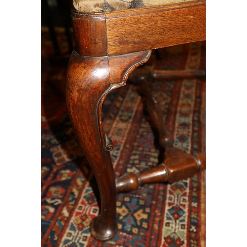 509 - A walnut and inlaid side chair with splat back and drop-in seat, on cabriole stretchered supports, a... 