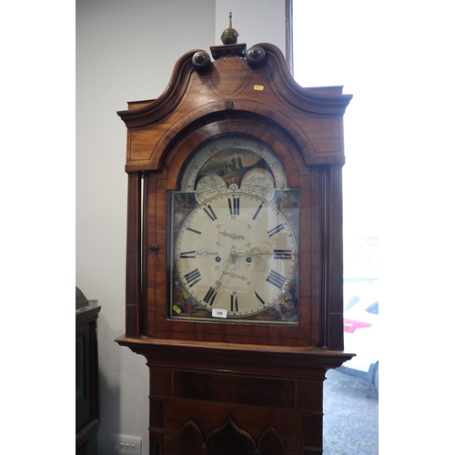 550 - An early 19th mahogany and inlaid long case clock with Gothic door, painted arch top dial, eight-day... 