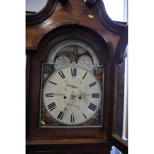 550 - An early 19th mahogany and inlaid long case clock with Gothic door, painted arch top dial, eight-day... 