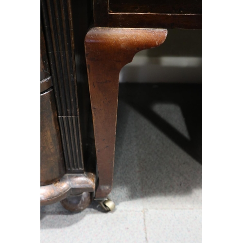 640 - An Edwardian mahogany writing table with faux leather top, fitted blind fretted drawers and two furt... 