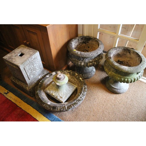 647 - A number of cast stone garden urns