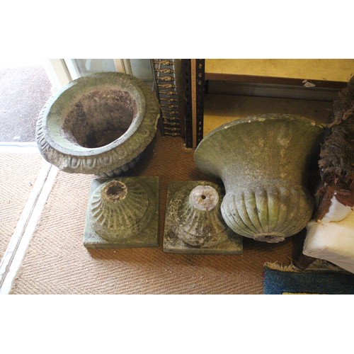 647 - A number of cast stone garden urns