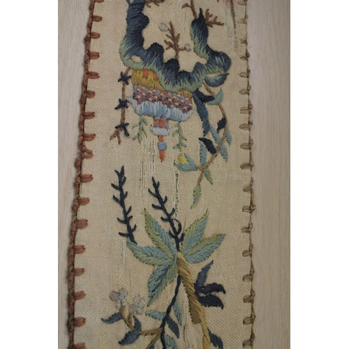 191 - A 19th century crewel work bell pull with floral and tree designs, 80