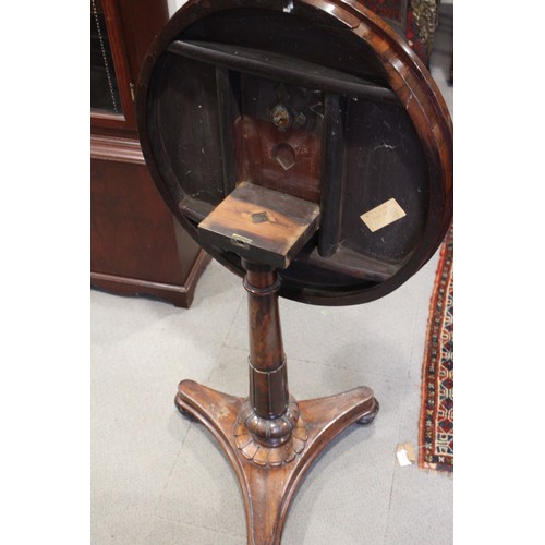 520 - An early 19th century mahogany and rosewood banded circular top occasional table, on carved column a... 