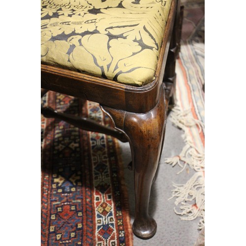 509 - A walnut and inlaid side chair with splat back and drop-in seat, on cabriole stretchered supports, a... 