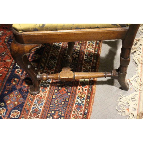 509 - A walnut and inlaid side chair with splat back and drop-in seat, on cabriole stretchered supports, a... 