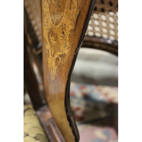 509 - A walnut and inlaid side chair with splat back and drop-in seat, on cabriole stretchered supports, a... 