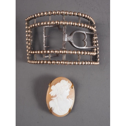 365 - A 19th century carved shell cameo, and a steel and yellow metal bead design shoe buckle