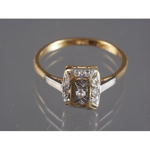 394 - An 18ct gold, platinum and diamond plaque ring, size R, 3.1g