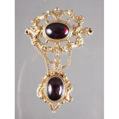 435 - A mid Victorian design 9ct gold brooch and pendant, set garnet cabochons