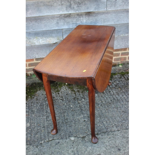 537 - An 18th century mahogany drop leaf table, on turned and tapered supports with pad feet, 43