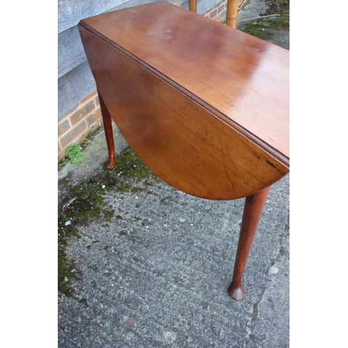 537 - An 18th century mahogany drop leaf table, on turned and tapered supports with pad feet, 43