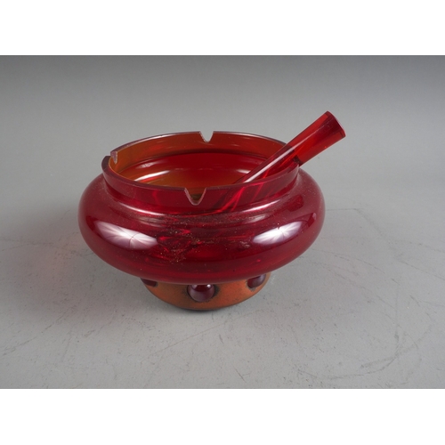 10 - A ruby glass pestle and mortar, 5 1/2