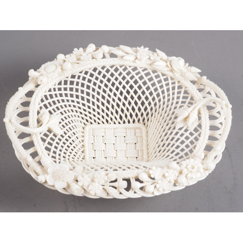 23 - A Belleek latticework bowl with floral decoration, 8