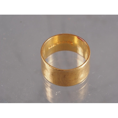 415 - A 22ct gold broad band with internal inscription, 6.8g