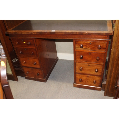 535 - A 19th century mahogany double pedestal desk with inset leather top over eight graduated drawers, on... 