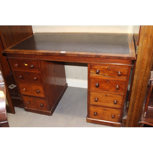 535 - A 19th century mahogany double pedestal desk with inset leather top over eight graduated drawers, on... 