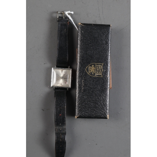 431 - A gentleman's 1960s Services watch with leather straps, in original box