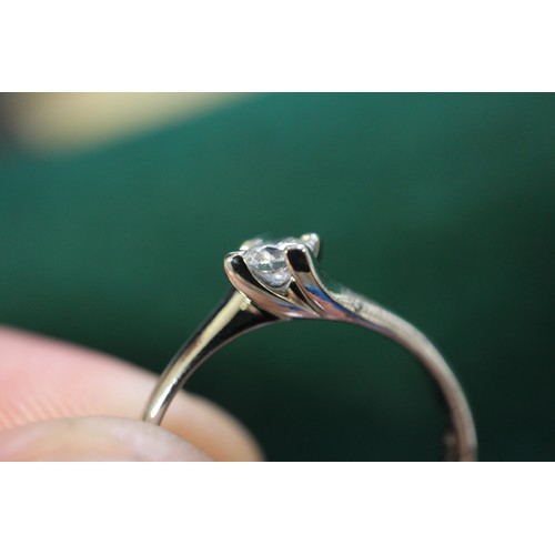 391 - A platinum and diamond solitaire ring, 0.2cts approx, size K, 3g