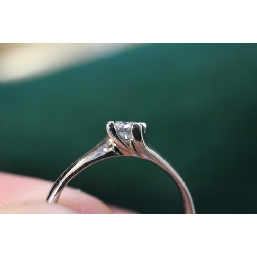 391 - A platinum and diamond solitaire ring, 0.2cts approx, size K, 3g