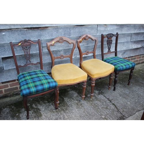 651 - A set of four of early 20th century carved walnut framed side chairs, upholstered in a tartan fabric... 