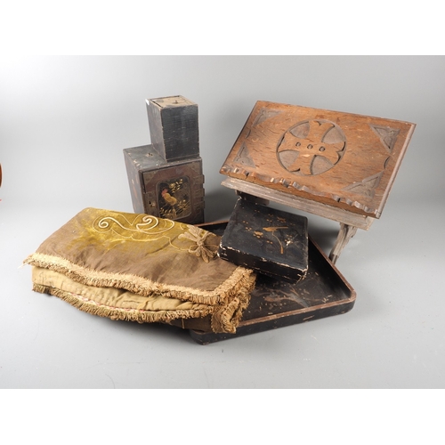 147 - Two Gothic style bible stands, a number of lacquered boxes etc, and an embroidered velvet table runn... 