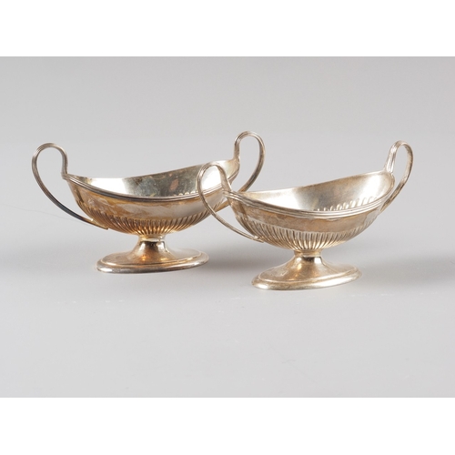 298 - A pair of Georgian style silver salt cellars with half fluted decoration, 6.1oz troy approx