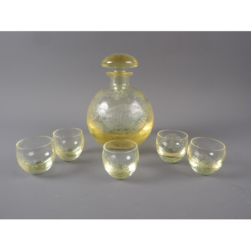 40 - A Moza? yellow glass liqueur set with engraved floral decoration