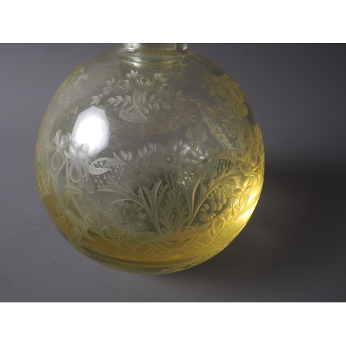 40 - A Moza? yellow glass liqueur set with engraved floral decoration