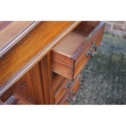 518 - A 19th century walnut Davenport desk with raised stationery compartment, fitted four drawers, on cas... 