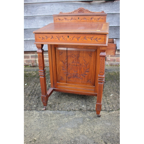 518 - A 19th century walnut Davenport desk with raised stationery compartment, fitted four drawers, on cas... 