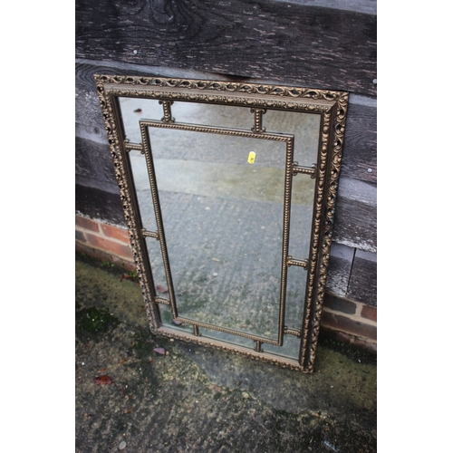 569 - A gilt frame wall mirror with 