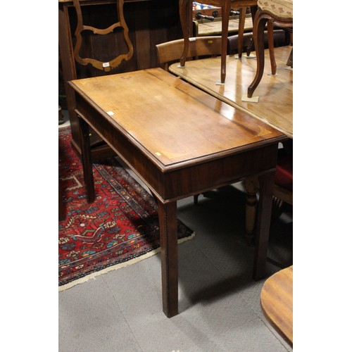 511 - An early 19th century mahogany and line inlaid side table, 44