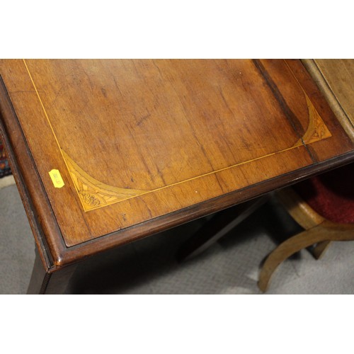 511 - An early 19th century mahogany and line inlaid side table, 44