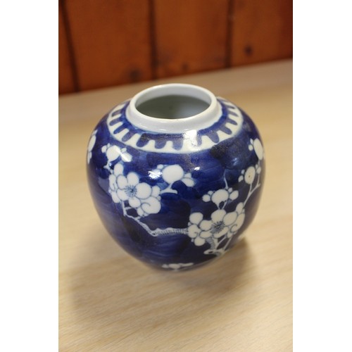 94 - A Chinese Famille Rose dish with central interior scene, figures and precious object decoration surr... 