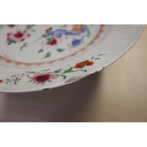 94 - A Chinese Famille Rose dish with central interior scene, figures and precious object decoration surr... 