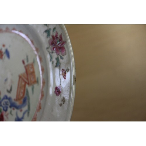 94 - A Chinese Famille Rose dish with central interior scene, figures and precious object decoration surr... 