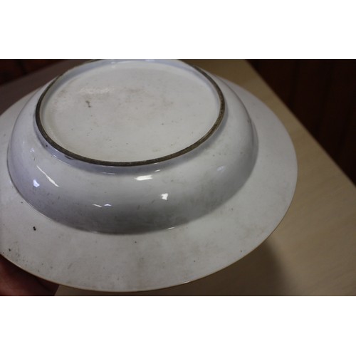 94 - A Chinese Famille Rose dish with central interior scene, figures and precious object decoration surr... 