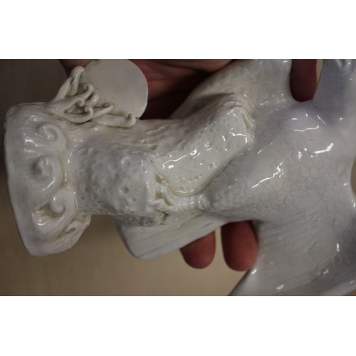 94 - A Chinese Famille Rose dish with central interior scene, figures and precious object decoration surr... 