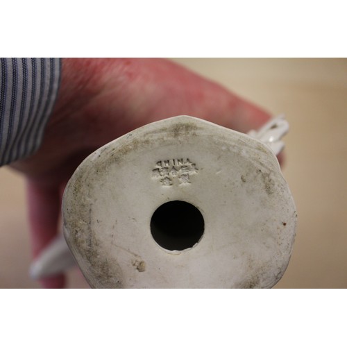 94 - A Chinese Famille Rose dish with central interior scene, figures and precious object decoration surr... 