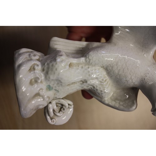 94 - A Chinese Famille Rose dish with central interior scene, figures and precious object decoration surr... 