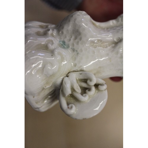 94 - A Chinese Famille Rose dish with central interior scene, figures and precious object decoration surr... 