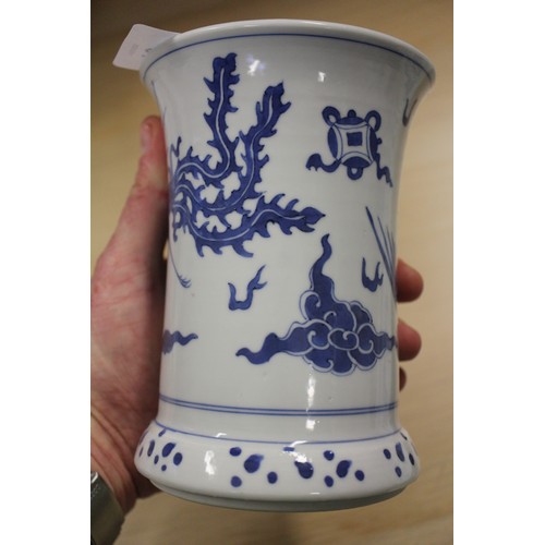 79 - A Chinese blue and white flared rim vase with flower and tree decoration, 7 1/4