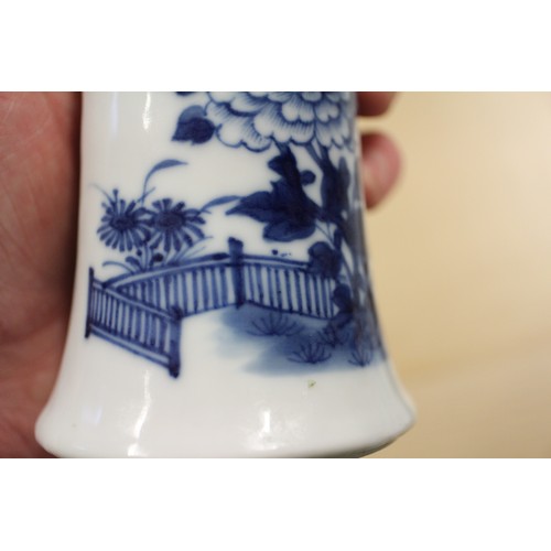 79 - A Chinese blue and white flared rim vase with flower and tree decoration, 7 1/4