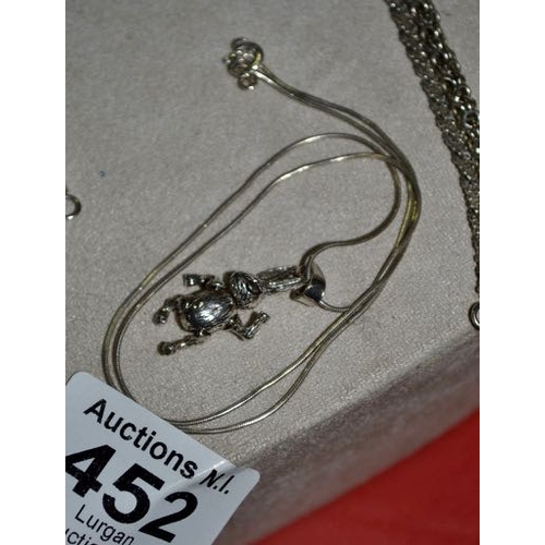 452 - Silver necklace with silver moving limbs hare pendant