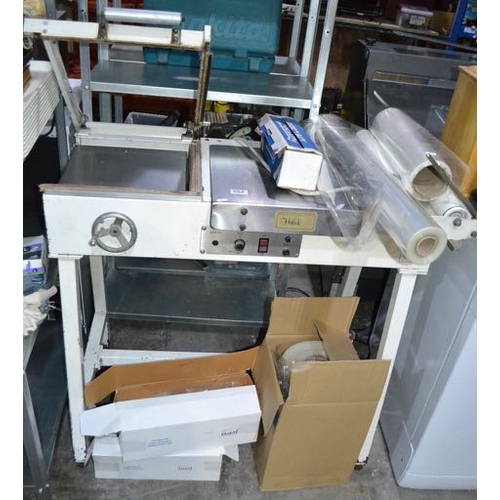 554 - Hawk Wrap / Sealing Machine With Boxes Of Wrap