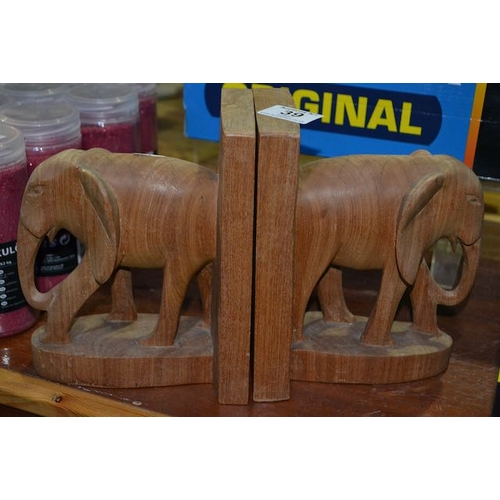 39 - Pair Of Carved Elephant Detail Bookends